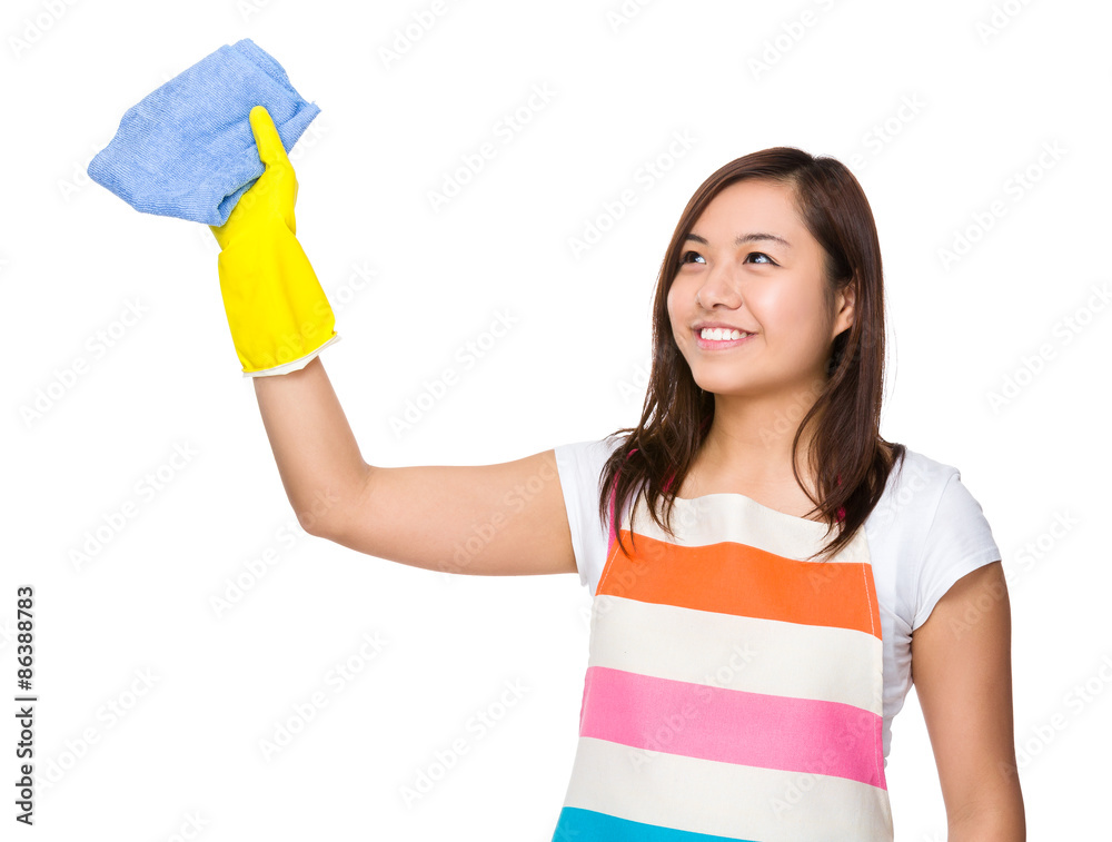 Housewife washing the imaginary space for using the rag Housewife washing the imaginary space for using the rag