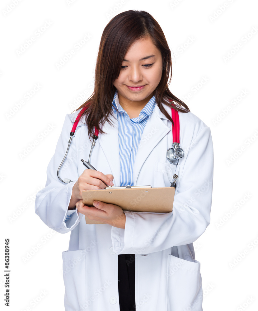 Doctor woman write the report Doctor woman write the report