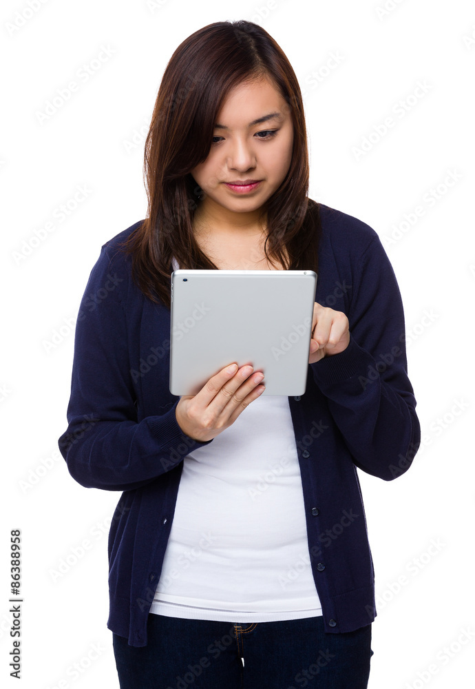 Young woman use of the tablet pc Young woman use of the tablet pc