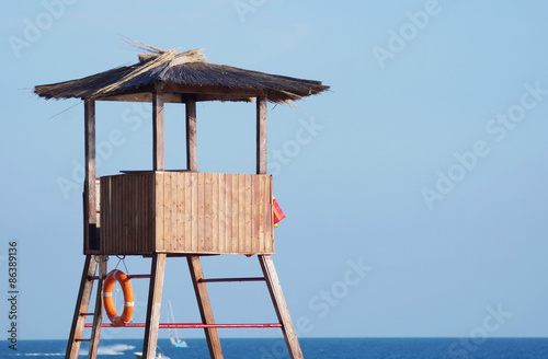 Rescue tower next to the sea © Alex_Po
