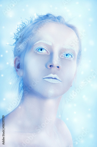 White woman with transparent eyes and white makeup