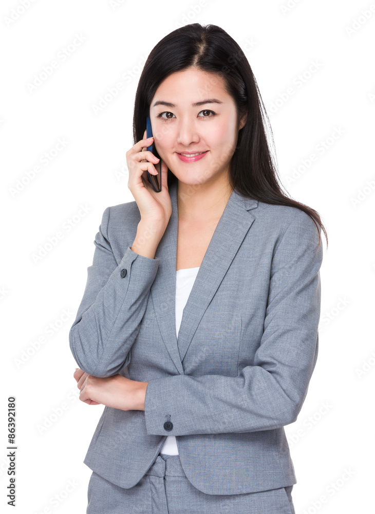 Businesswoman talk to cellphone Businesswoman talk to cellphone