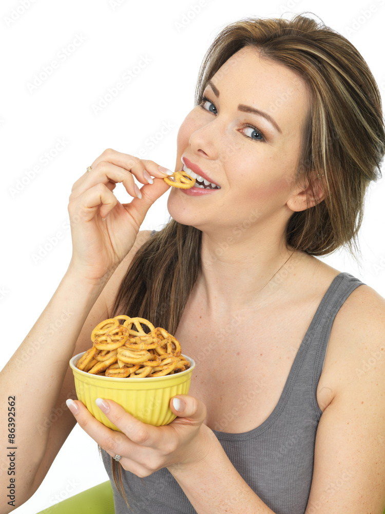 Attractive Young Woman Holding a Bowl of Salted Pretzel Snacks Attractive Young Woman Holding a Bowl of Salted Pretzel Snacks