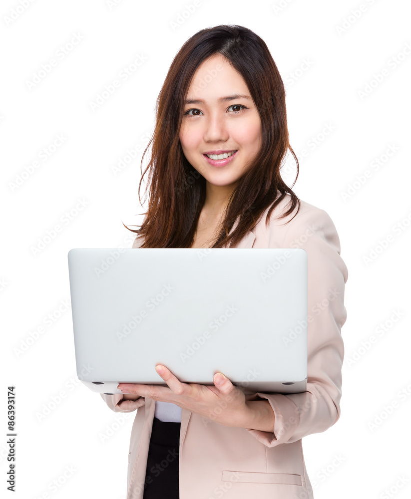 Young businesswoman use of the laptop computer Young businesswoman use of the laptop computer