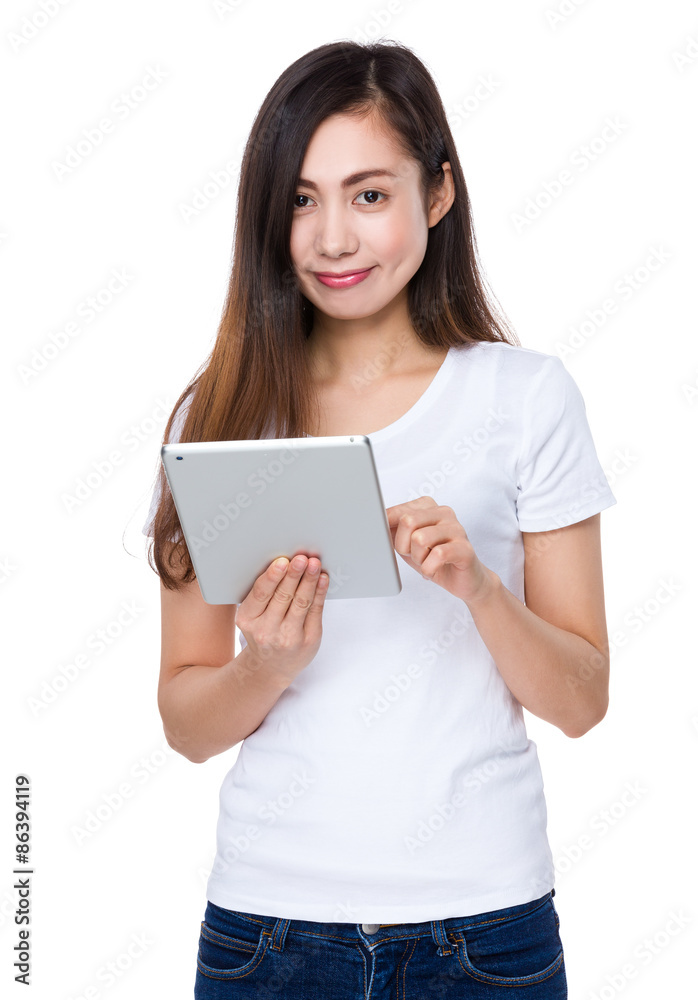 Asian Woman use of the tablet pc Asian Woman use of the tablet pc