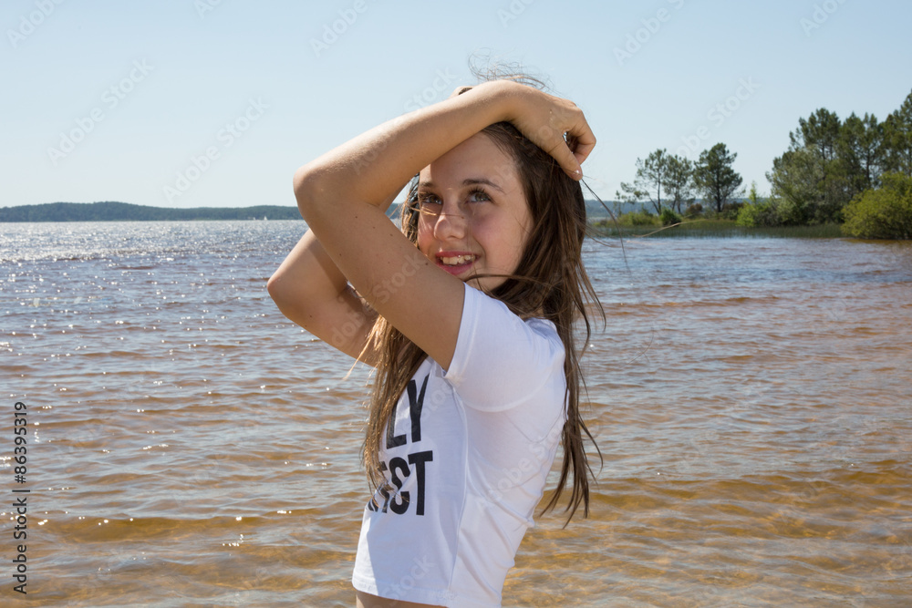 Lovely young girl posing for the camera on holidays