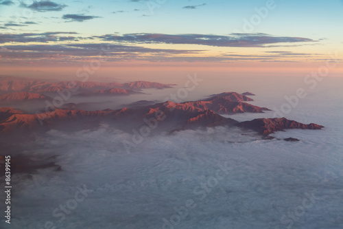 The Andes mountains rising out of a stratus cloudlayer © straystone