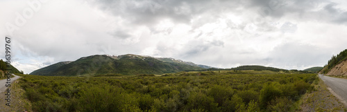 Panorama with road and mountains of Altai