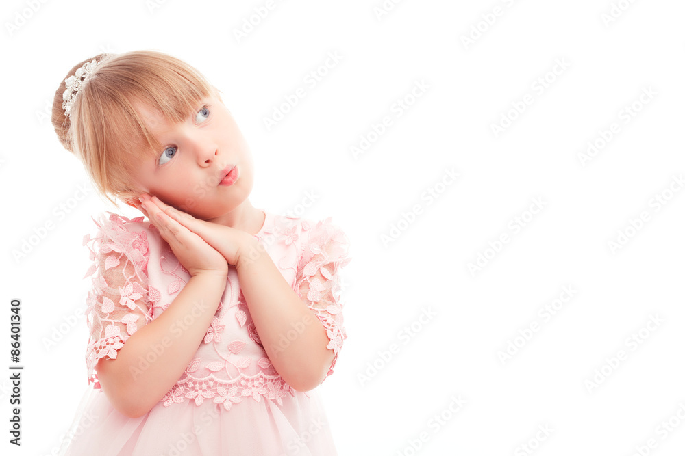 Pretty little girl leaning her head on hands Pretty little girl leaning her head on hands