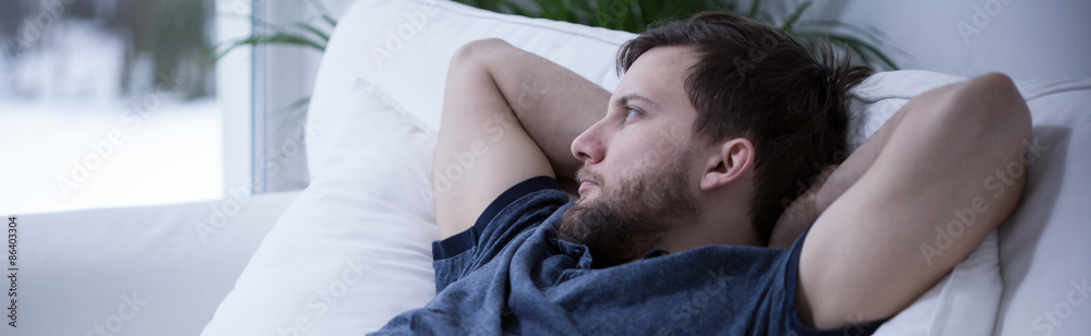 Obraz premium Man suffering from insomnia