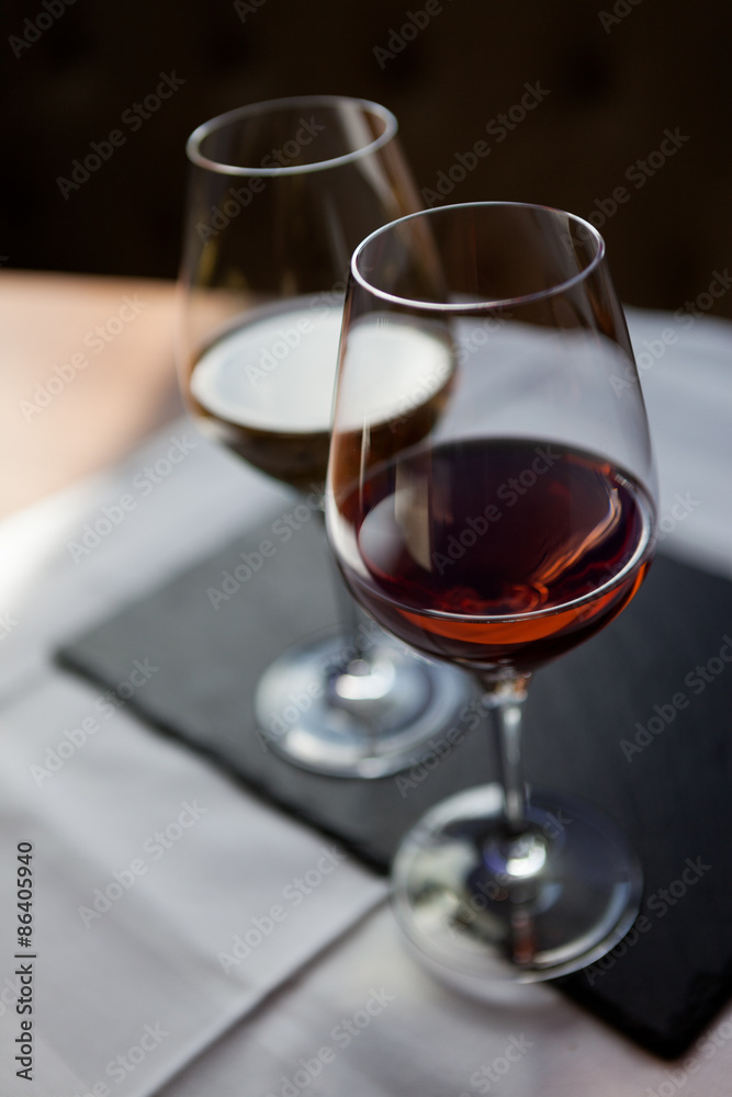 Closeup of two glasses of rose and white wine