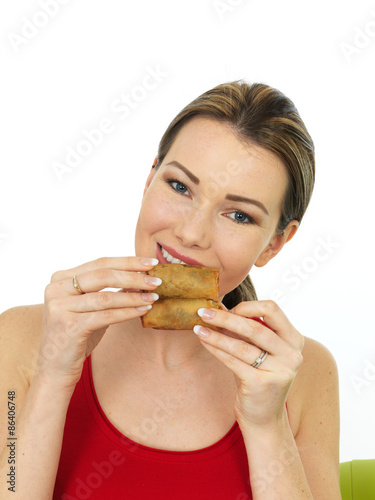 Attractive Young Woman Holding Chinese Style Vegetable Spring Rolls