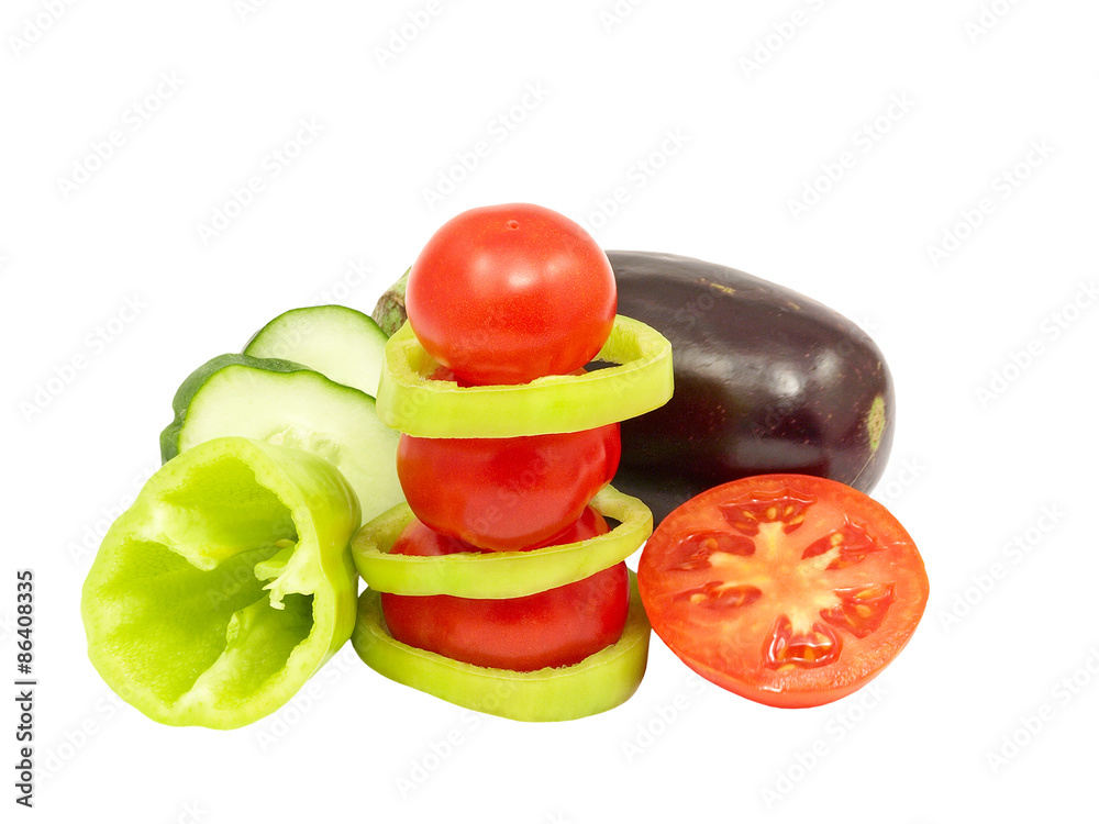 Tomatoes and fresh vegetables.Isolated. Tomatoes and fresh vegetables.Isolated.