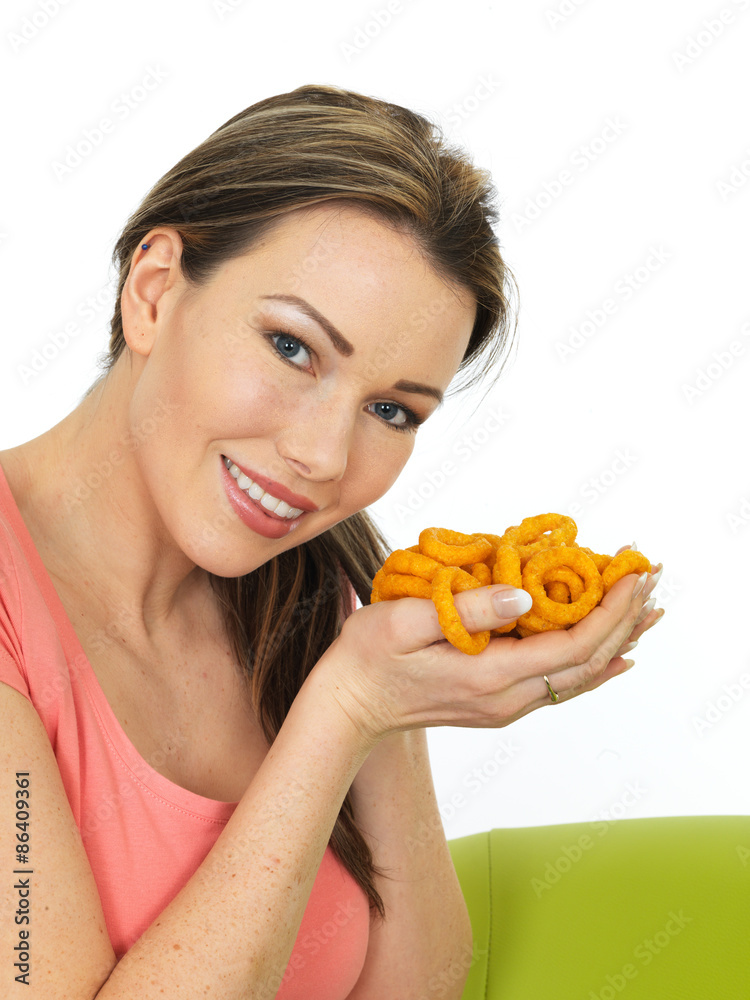 Attractive Young Woman Holding A Handful Of Onion Flavoured Rings Attractive Young Woman Holding A Handful Of Onion Flavoured Rings