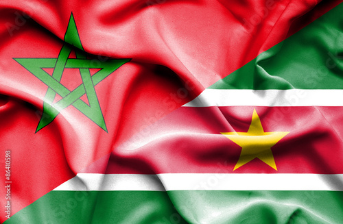 Waving flag of Suriname and Morocco