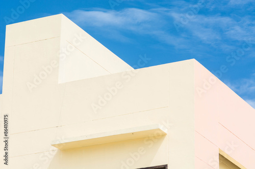abstract building over bright sunny blue sky
