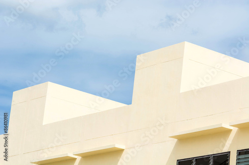 abstract building over bright sunny blue sky