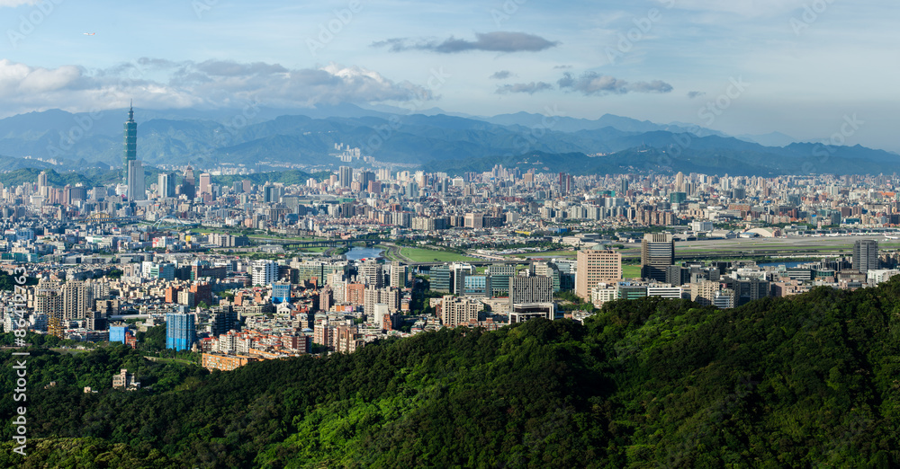 Taipei City / A panoramic view of Taipei City with Taipei 101. As seen from the Bi Shan Yan Temple during the early morning hours. High resolution picture can be easily cropped to suit.