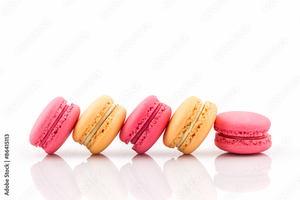 Sweet and colourful french macarons on white background, Dessert. Sweet and colourful french macarons on white background, Dessert.