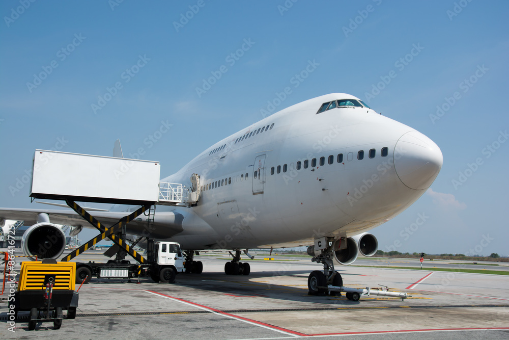 Airplane near the terminal in an airport