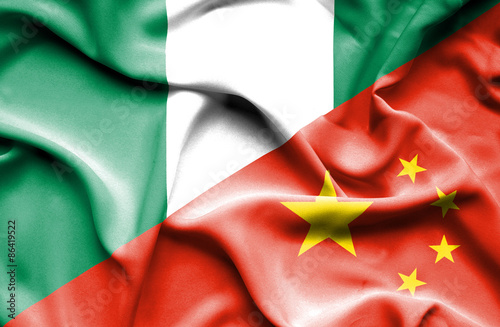 Waving flag of China and Nigeria