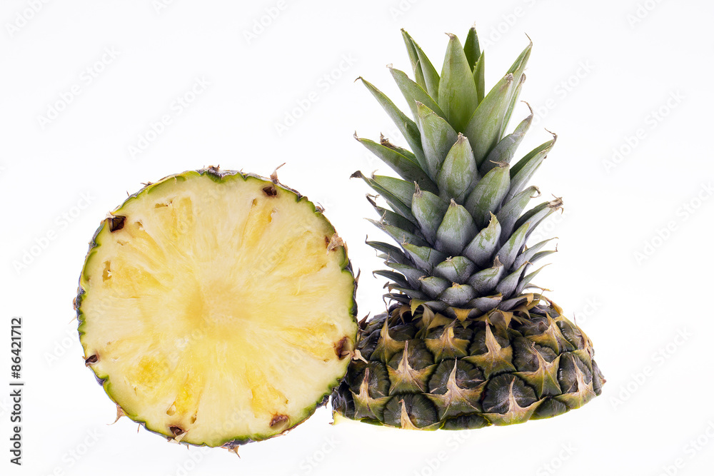half of ripe pinapple isolated on white background half of ripe pinapple isolated on white background