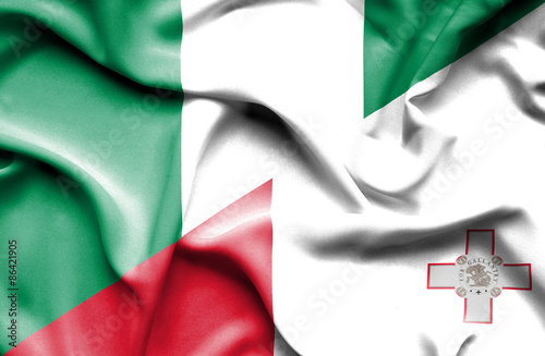 Waving flag of Malta and Nigeria photo