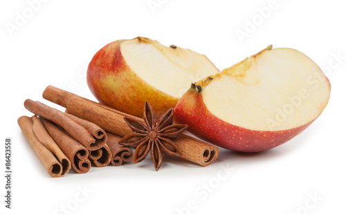 Asterisks anise, cinnamon sticks and apple