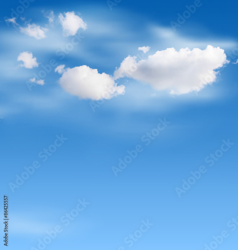 White clouds in the sky on blue background