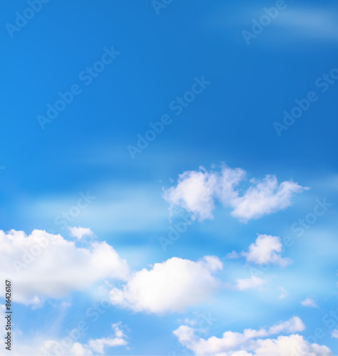 White clouds in the sky on blue background