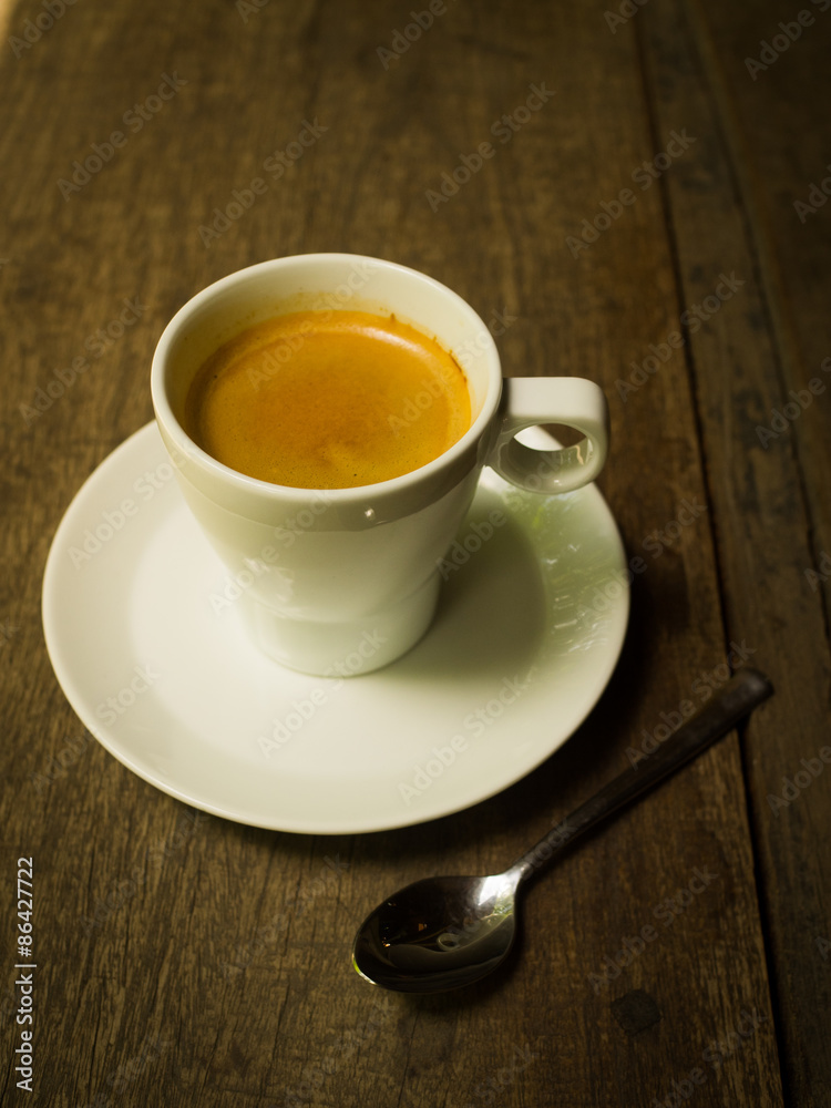 cup of coffee espresso on the wood desk cup of coffee espresso on the wood desk