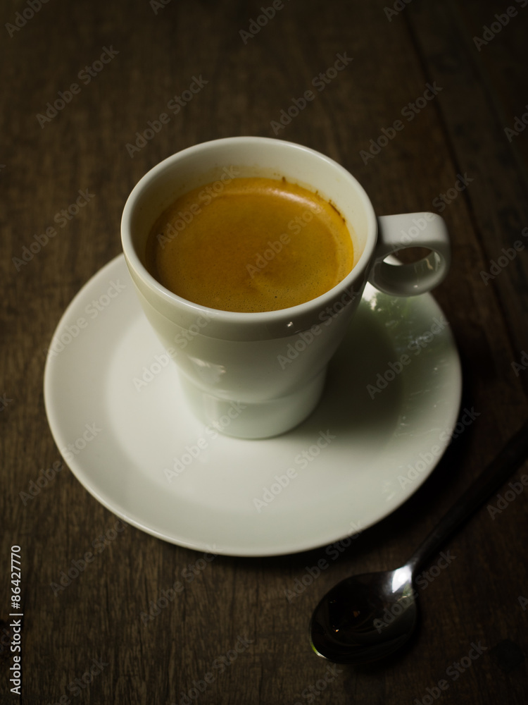 cup of coffee espresso on the wood desk cup of coffee espresso on the wood desk