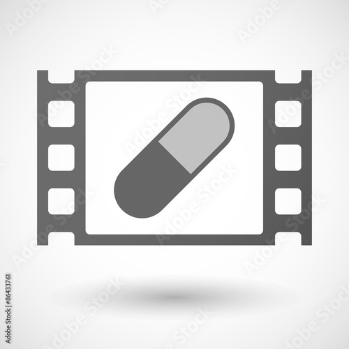 35mm film frame with a pill