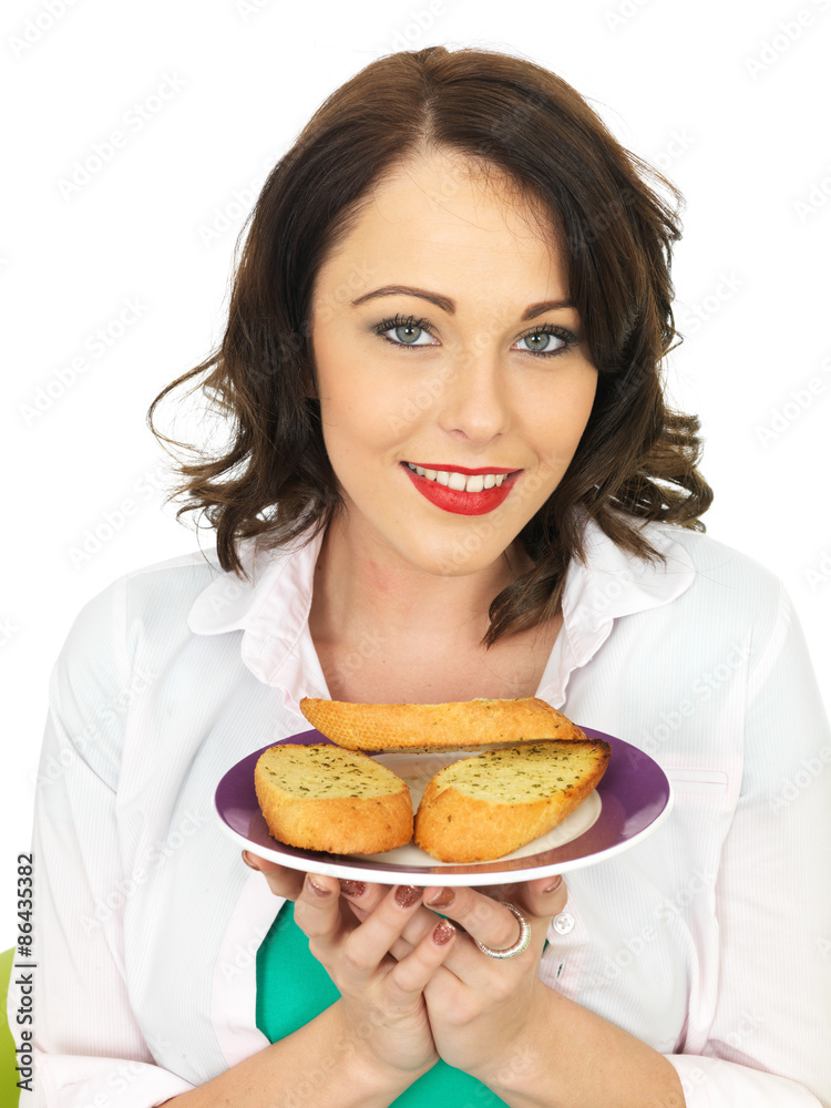 Pretty Young Woman in Her Twenties Eating A Slice of Garlic Bread