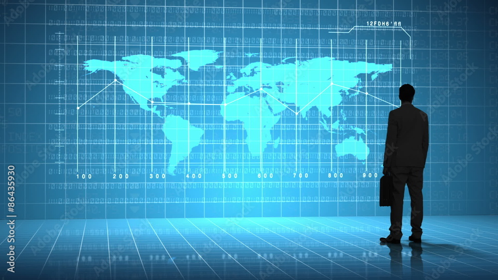 Businessman looking at global business interface Businessman looking at global business interface