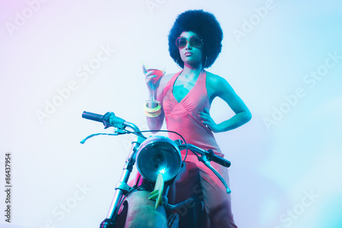 Elegant Lady with Cocktail on her Motorcycle