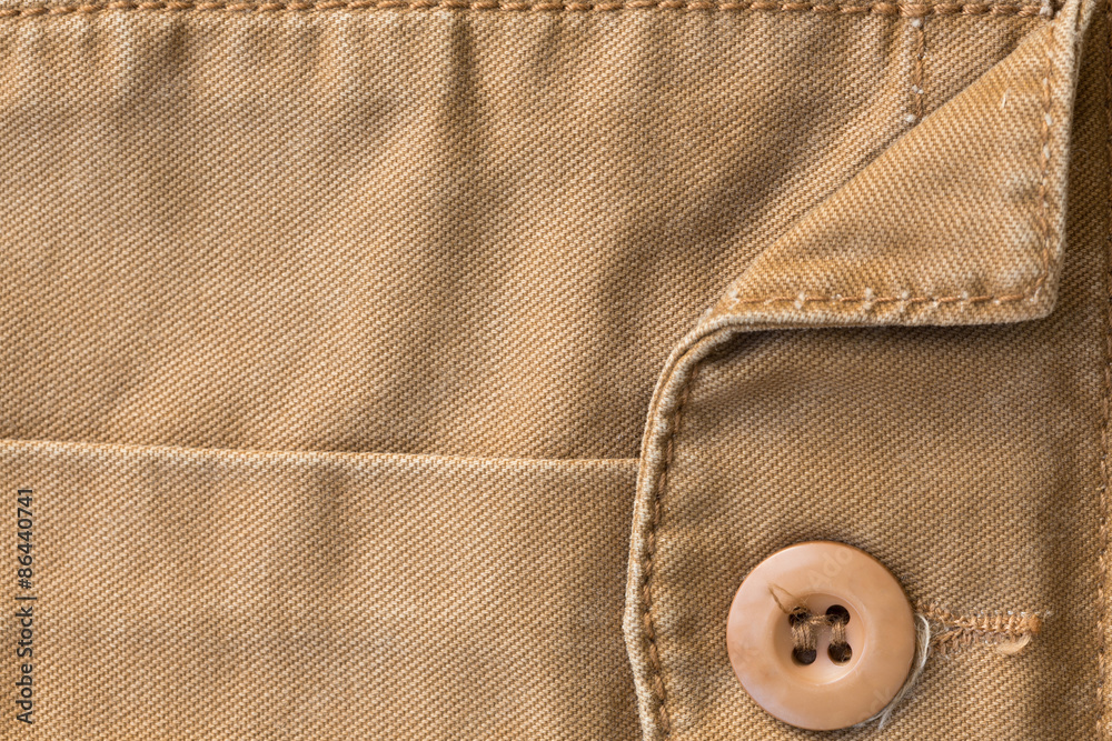 front pocket on brown shirt textile texture background front pocket on brown shirt textile texture background