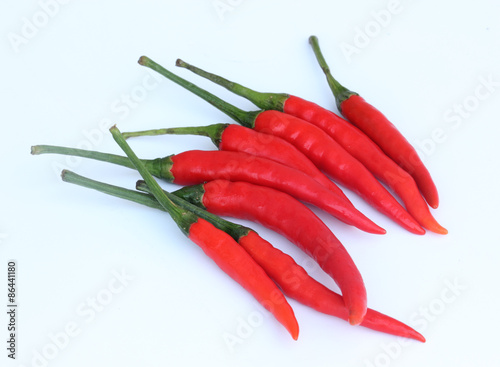 Red hot peppers on white background