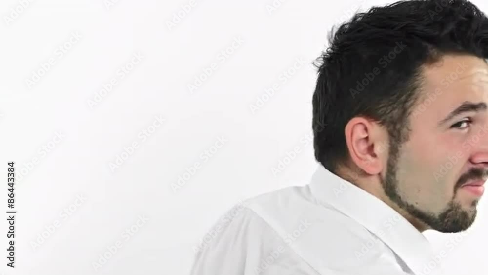 The emotion of surprise and smile beautiful young men on a white The emotion of surprise and smile beautiful young men on a white