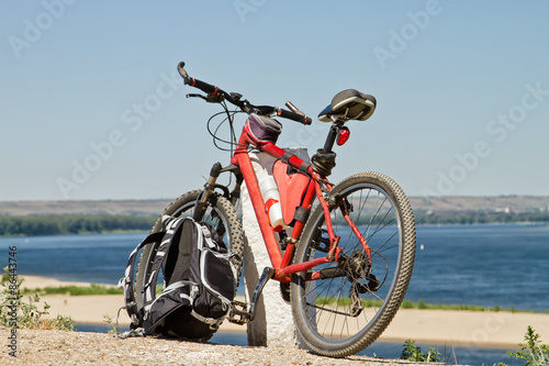 Mountain Bike stay on the background of river scenery