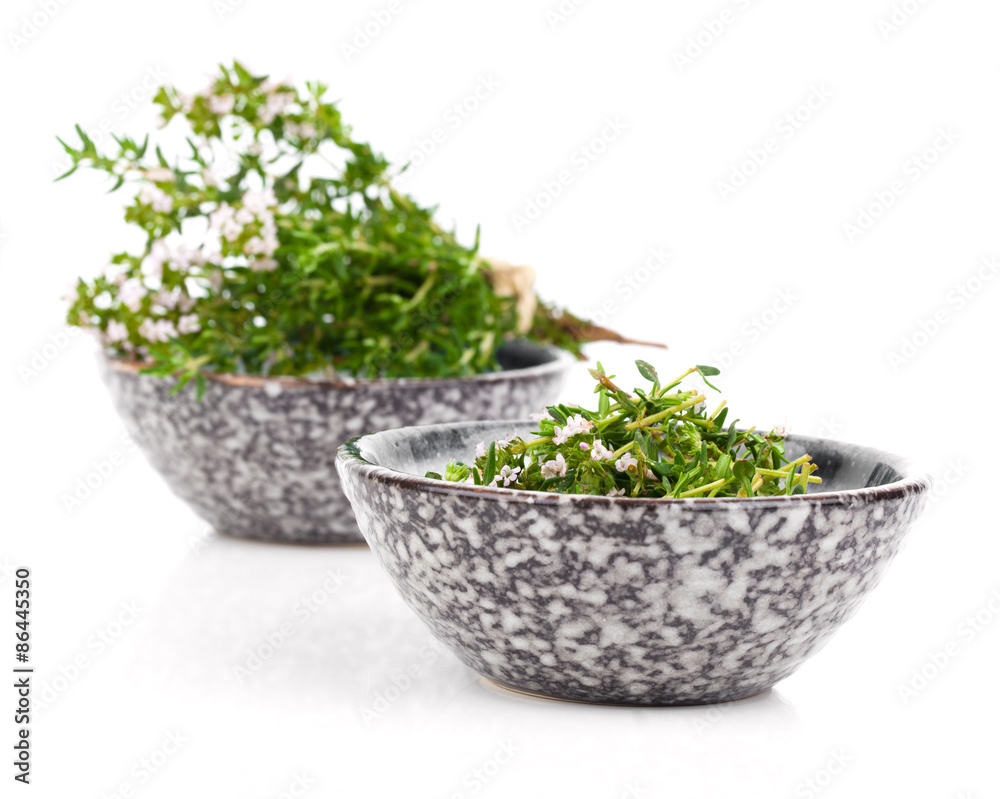 Thyme in bowl isolated on white background. Thyme in bowl isolated on white background.