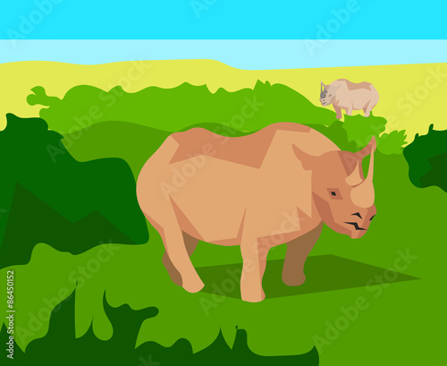 Rhino on background bushes  animals and nature