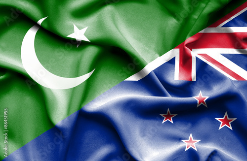 Waving flag of New Zealand and Pakistan