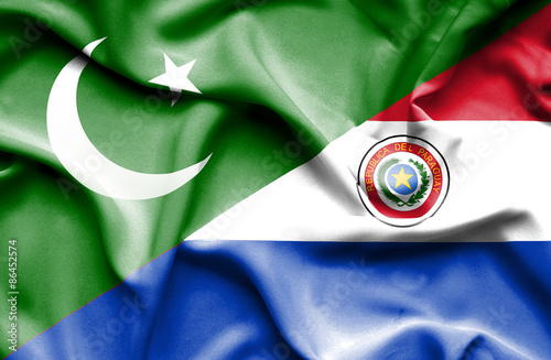 Waving flag of Paraguay and Pakistan