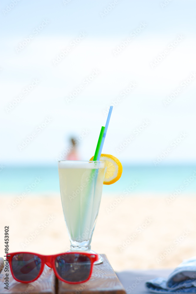 Fresh cold lemonade on a sunny beach