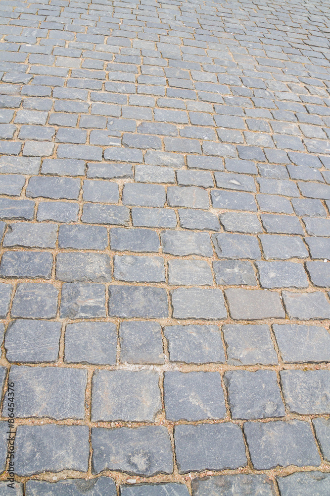 The road is paved with large stone The road is paved with large stone