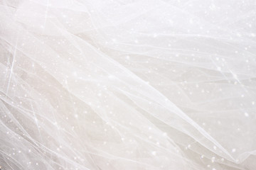 Vintage tulle chiffon texture background with glitter overlay
