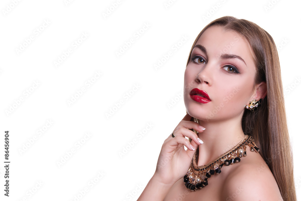 Closeup portrait of a beautiful girl with a black and gold necklace around her neck. Isolated over white background. Copy space.