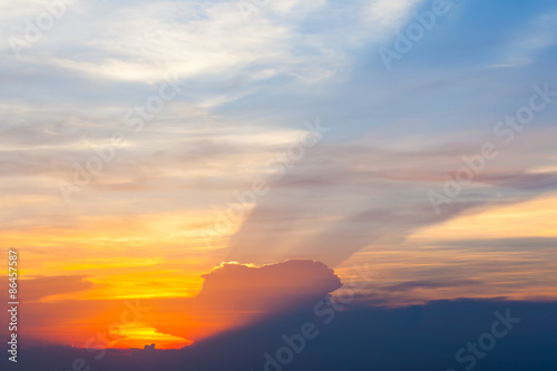 Sunset with sun rays in the sky.