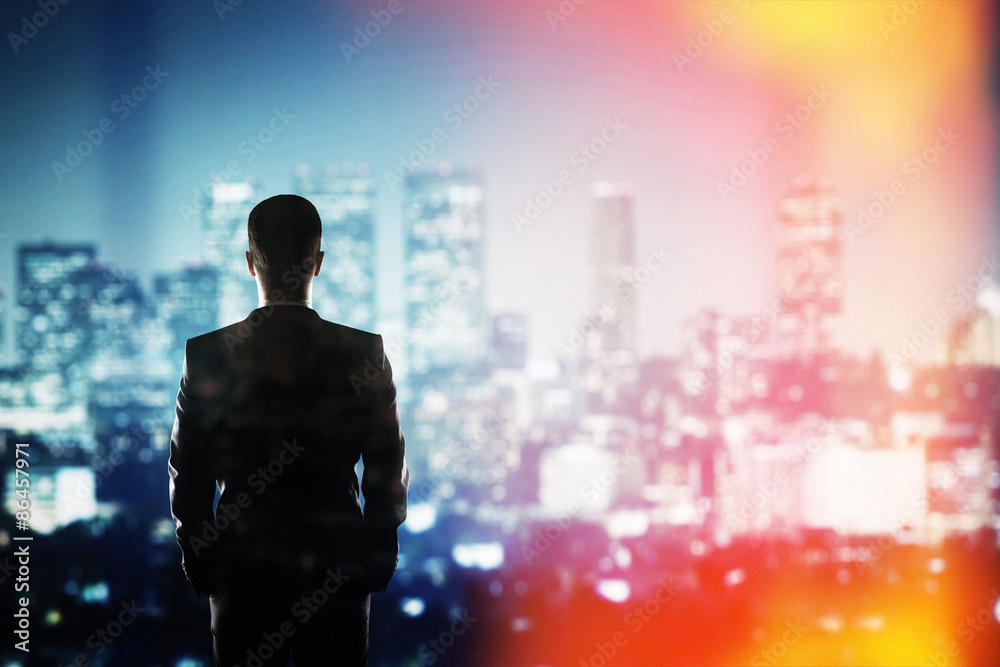 businessman looking to night city businessman looking to night city